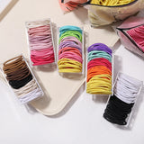 Lot de 50 bandeaux élastiques en caoutchouc pour cheveux, style macaron, très élastiques, durables, pour queue de cheval haute, pour femmes et enfants