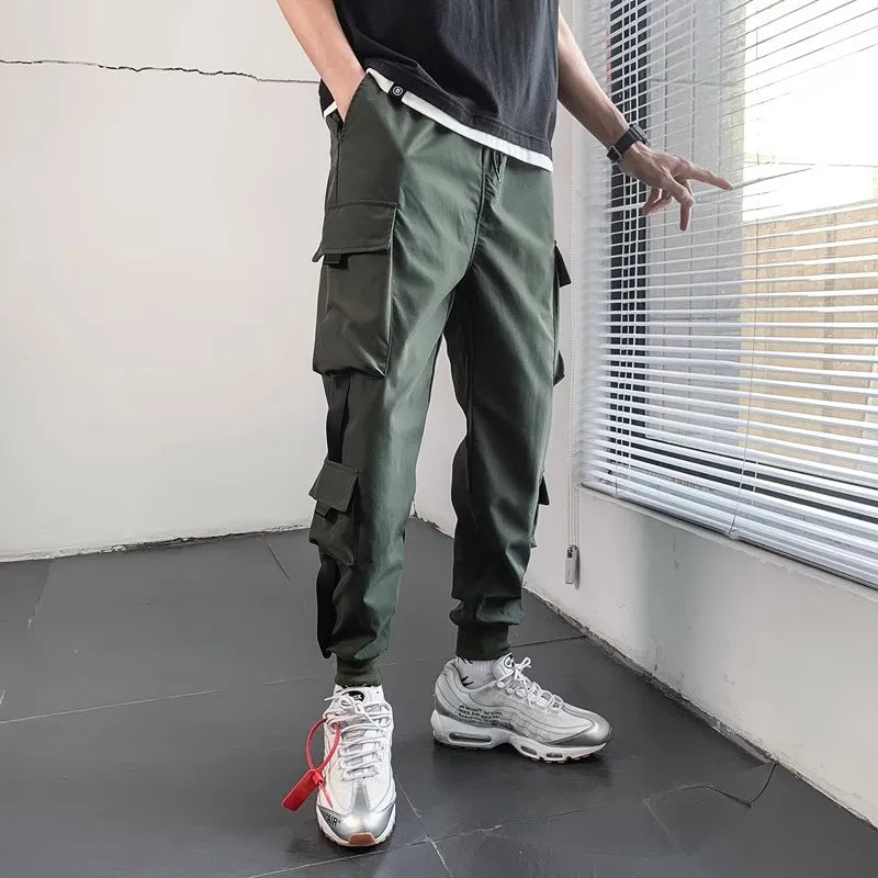 Pantalon cargo style hip-hop pour homme, sarouel multi-poches, style streetwear décontracté, collection printemps 2023