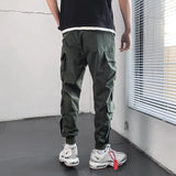 Pantalon cargo style hip-hop pour homme, sarouel multi-poches, style streetwear décontracté, collection printemps 2023
