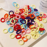 LOVEKIKI 50 bandas elásticas para el cabello, accesorios para el cabello para niñas, mini diademas de nailon coloridas, soporte para coletas, adornos para el cabello