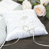 Coussin porte-alliances romantique avec ruban et perles, idéal pour cérémonie de mariage ou comme coussin de poche avec rubans décoratifs