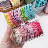 Lot de 50 bandeaux élastiques en caoutchouc pour cheveux, style macaron, très élastiques, durables, pour queue de cheval haute, pour femmes et enfants