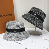 Women's Cap Hollowed Out Breathable Sunscreen Sun Visor Spring and Summer Braided Top Hat Temperament British Fisherman's Hats