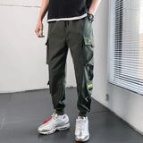 Pantalon cargo style hip-hop pour homme, sarouel multi-poches, style streetwear décontracté, collection printemps 2023