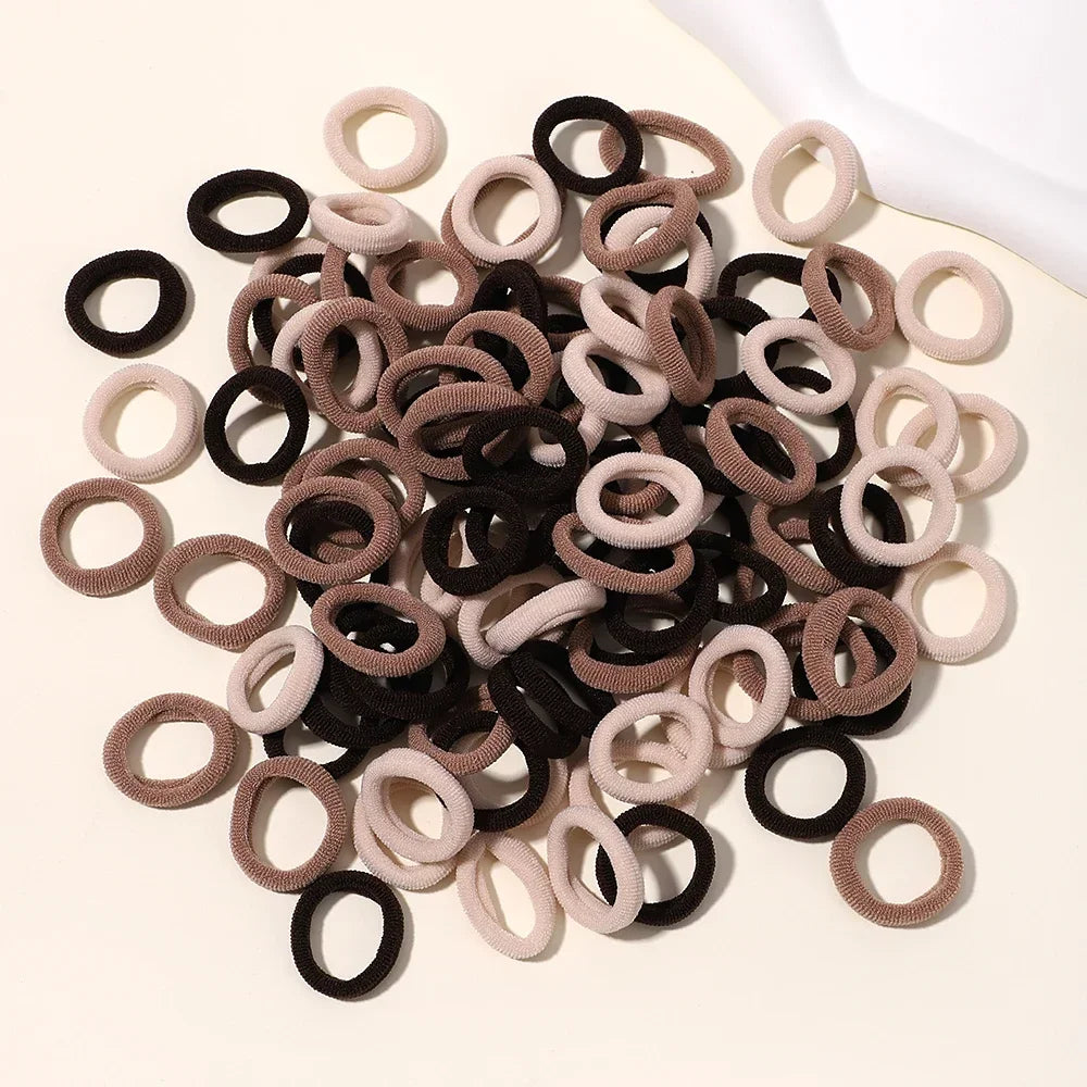 LOVEKIKI 50 bandas elásticas para el cabello, accesorios para el cabello para niñas, mini diademas de nailon coloridas, soporte para coletas, adornos para el cabello